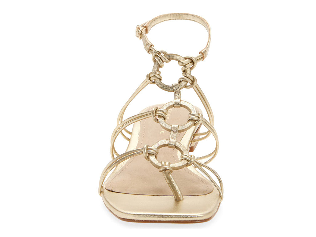 gold strappy sandal front view of the upper with circles