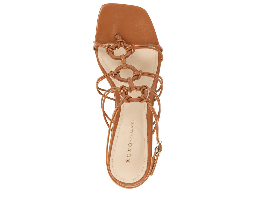 tan colored sandal with thin straps, ankle strap, and low heel - top view of upper and square toe