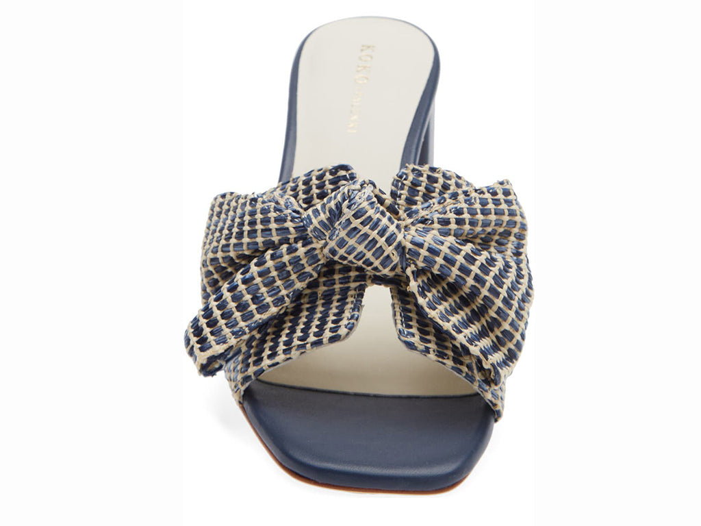 navy raffia block heel sandal with over size bow - view from the front of the shoe