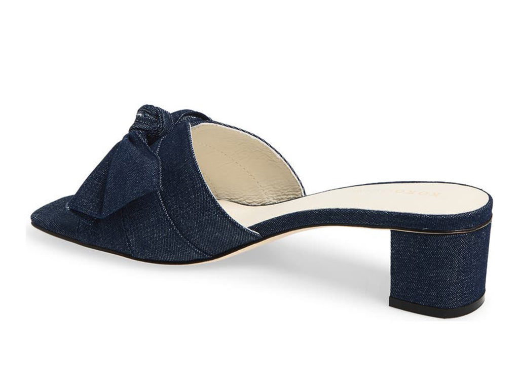 Blue denim slide sandal with a bow and block heel - view of block heel and upper from side