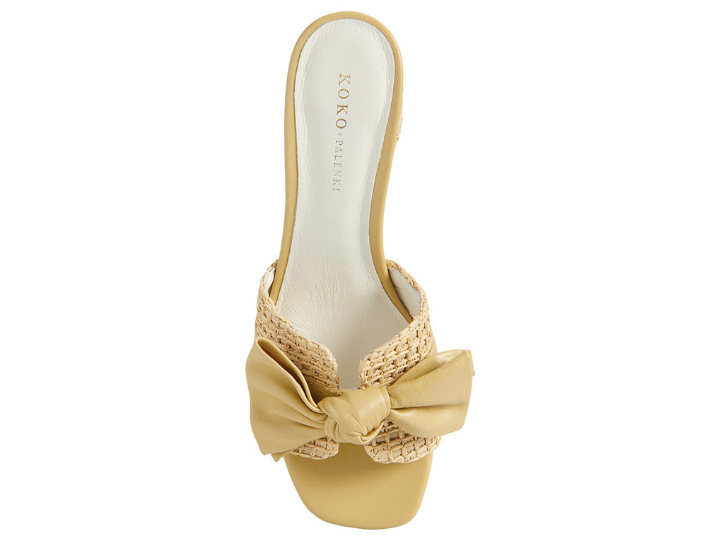 Beige sandal with woven details and a bow on a block heel - top view