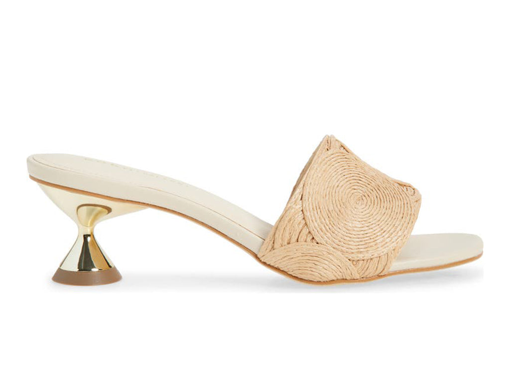 Slide sandal with a gold flared heel and one strap circle pattern raffia upper- side view